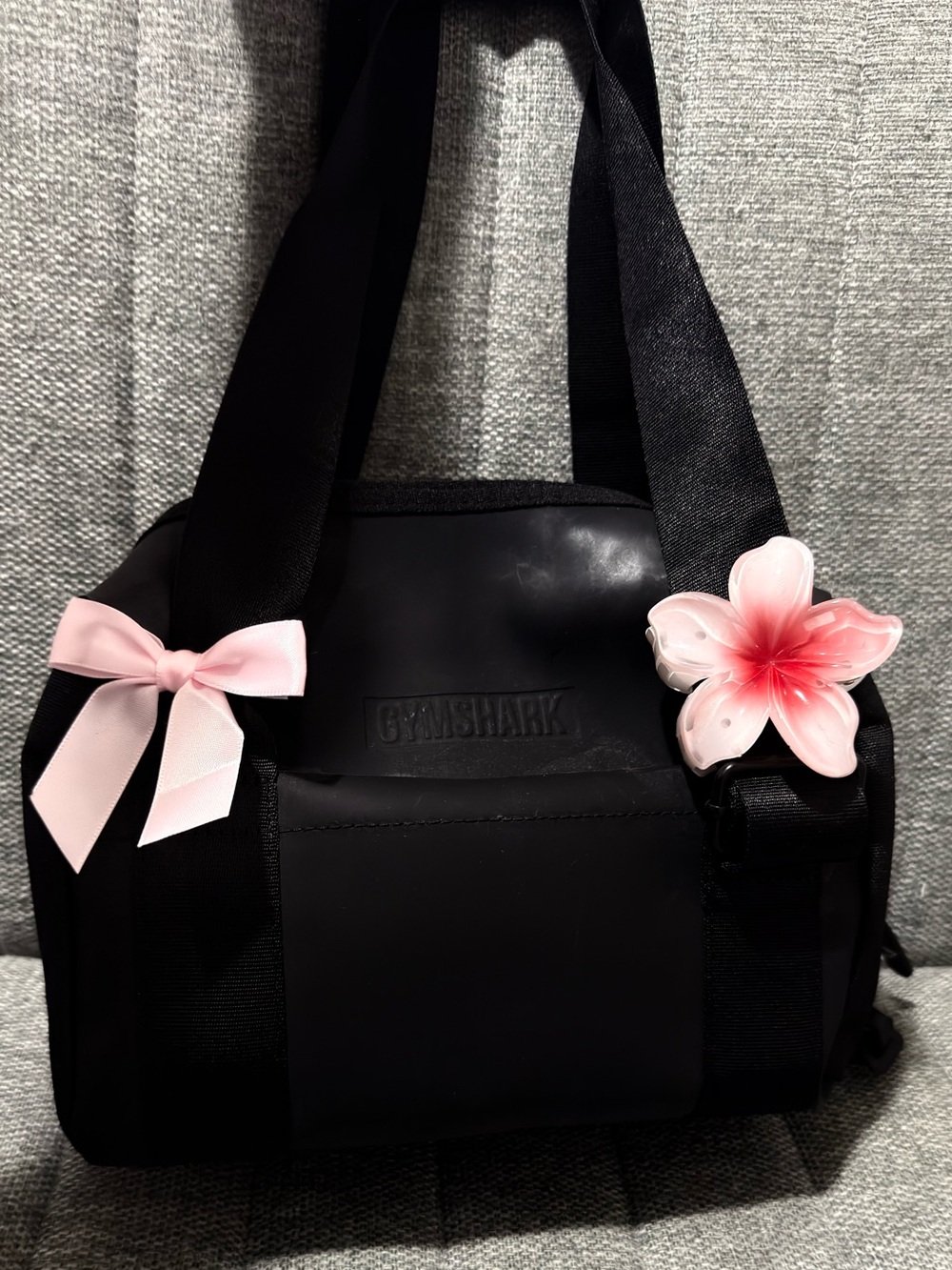 Gymshark Mini Black Shoulder Bag. I added the bows but I can remove them.